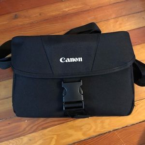 Canon Camera Bag, Canon Lens, and accessories.